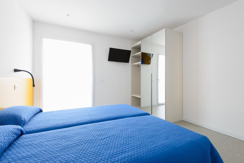Residenza Edda Lejlighed Lignano Sabbiadoro Værelse billede